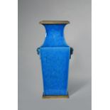 A CHINESE TURQUOISE GLAZED SQUARE-SECTION VASE 18TH/19TH CENTURY The body tapering towards the