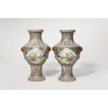 A PAIR OF CHINESE FAMILLE ROSE 'BOYS' VASES 20TH CENTURY Each painted with two cartouches