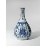 A CHINESE BLUE AND WHITE KRAAK PORCELAIN BOTTLE VASE WANLI 1573-1620 The moulded pear-shaped body