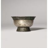A SMALL CHINESE METAL ALLOY CUP TANG DYNASTY OR LATER The U-shaped body supported on a spread foot