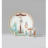 A CHINESE DUTCH-DECORATED 'CRUCIFIXION' TEA BOWL AND SAUCER 18TH CENTURY Depicting Christ on the