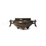 A SMALL CHINESE SILVER INLAID 'SHI SOU' BRONZE TRIPOD INCENSE BURNER QING DYNASTY The compressed