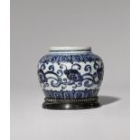 A SMALL CHINESE BLUE AND WHITE MING-STYLE JAR PROBABLY QING DYNASTY Decorated with a continuous