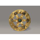 A CENTRAL ASIAN TURQUOISE-INSET GOLD CIRCULAR APPLIQUE 19TH/20TH CENTURY The roundel pierced with