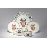 SIX CHINESE ARMORIAL PORCELAIN ITEMS C.1745 Comprising: a plate, three saucers, a tea bowl and a