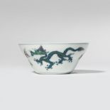 A SMALL CHINESE DOUCAI 'DRAGON' BOWL SIX CHARACTER YONGZHENG MARK AND PROBABLY OF THE PERIOD The