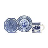 A CHINESE BLUE AND WHITE MUG AND TWO PLATES 18TH CENTURY The mug decorated with a watery pagoda