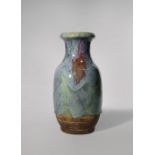 A CHINESE JUN-TYPE VASE QING DYNASTY With an ovoid body and waisted flared neck, covered with a