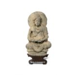 A GANDHARAN GREY SCHIST FIGURE OF BUDDHA C.2ND CENTURY AD Depicted seated in a meditative pose on