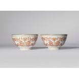 A PAIR OF SMALL CHINESE IRON-RED ENAMELLED AND GILT-DECORATED 'BATS AND DRAGONS' BOWLS 20TH