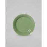 A CHINESE GREEN GLAZED DISH SIX CHARACTER QIANLONG MARK BUT PROBABLY LATER The shallow body