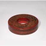 A CHINESE TIANQI RED LACQUER CIRCULAR NECKLACE BOX AND COVER QING DYNASTY OR LATER The cover
