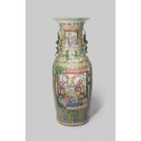 A MASSIVE CHINESE CANTON FAMILLE ROSE VASE 19TH CENTURY Painted with panels enclosing scenes of