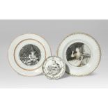 TWO CHINESE EN GRISAILLE PLATES AND A SAUCER C.1750 One plate painted with a seamstress, another