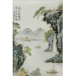 A SMALL CHINESE PORCELAIN 'LANDSCAPE' PLAQUE REPUBLIC PERIOD DATED 1919 Painted with figures boating