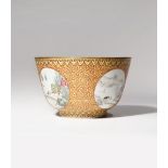 A CHINESE FAMILLE ROSE AND EN GRISAILLE MEDALLION BOWL 19TH CENTURY The exterior decorated with four