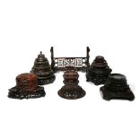 A SMALL COLLECTION OF CHINESE WOOD STANDS AND COVERS 19TH AND 20TH CENTURY Comprising: fifteen