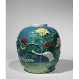 A CHINESE FAHUA-STYLE JAR LATE QING DYNASTY/REPUBLIC PERIOD Decorated in relief with an egret
