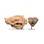 A KUSHAN SANDSTONE FRAGMENT OF A SEATED BUDDHA AND AN INDIAN SANDSTONE FRAGMENT OF PARVATI C.2ND AND