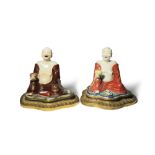 TWO CHINESE POLYCHROME FIGURES OF LUOHANS QIANLONG 1736-95 Each depicted seated holding an alms bowl