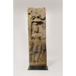 A LARGE INDIAN STONE CARVING OF AN ATTENDANT PROBABLY C.5TH CENTURY The female figure stands in