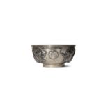 A CHINESE INSCRIBED SILVER 'DRAGON' BOWL LATE QING DYNASTY Decorated in repouss? with two scaly