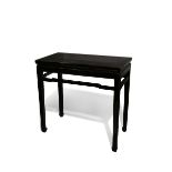 A CHINESE BLACK LACQUERED SIDE TABLE QING DYNASTY The rectangular top raised on straight legs with