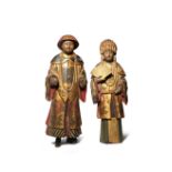 A PAIR OF CHINESE LACQUERED AND GILT-WOOD FIGURES 19TH CENTURY Depicting a gentleman and a lady,