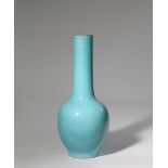 A CHINESE TURQUOISE GLAZED BOTTLE VASE LATE QING DYNASTY The exterior evenly coated in a pale