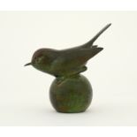 ‡ Geoffrey Dashwood (b.1947) Goldcrest on a ball Signed, numbered 12/24 and inscribed P.E. Bronze