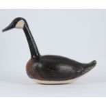 ‡ Guy Taplin (b. 1939) Canada goose Painted wood with glass bead eyes 46.5 x 65.5cm Provenance: