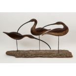 ‡ Guy Taplin (b. 1939) Three curlews Signed and titled Painted wood with glass bead eyes, metal