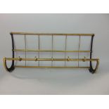 Continental cast brass tram hanging rack to include luggage rack and coats hooks, together with