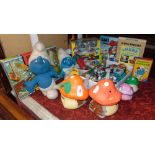 A large collection of Smurfs, the individual characters in a multitude of poses, together with Smurf