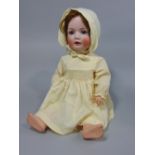 A Baha & Proschild bisque head doll, 34cm tall approx