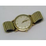 Early 1960s Omega 5 series 9ct gentleman's wrist watch, the champagne dial with baton markers,