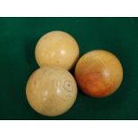 Three Victorian ivory billiard or snooker balls - 5cm diameter