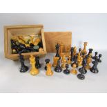 Two box wood and ebony chess sets in the manner of Staunton, one weighted