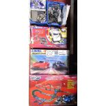 A collection of racing car games and modelling equipment