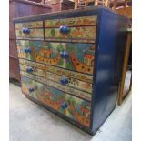 A vintage nursery chest fitted with two short over three long graduated drawers with painted