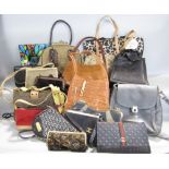 A collection of designer looking handbags and clutch bags