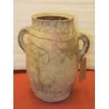 An old clay pot with loop handles and painted detail, 37cm high