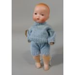 An Armande Marseille bisque head baby doll, mould number 341, with closed mouth, sleeping eyes, size