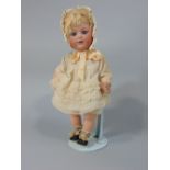 A Heubach 10532 mould doll, number 2, 27cm high