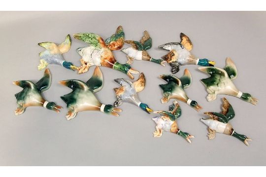 A collection of eleven various wall plaques in the form of mallard in flight including examples by J - Image 1 of 3