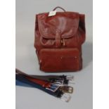 A fossil back pack, as new with tags, in brown leather, height 40cm, together with a collection of