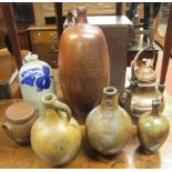 Two early stoneware Bellamines together with further glazed vessels, copper kettle, etc