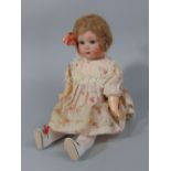 A Gebruder Heubach bisque head doll with teeth and sleeping eyes, mould number 8199, size 3/0,