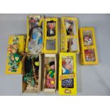 Six boxed Pelham puppets including dragon and baby, Big Bad Wolf (incorrectly boxed) old lady,
