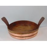 Oak and copper bound bread coaster 42cm wide